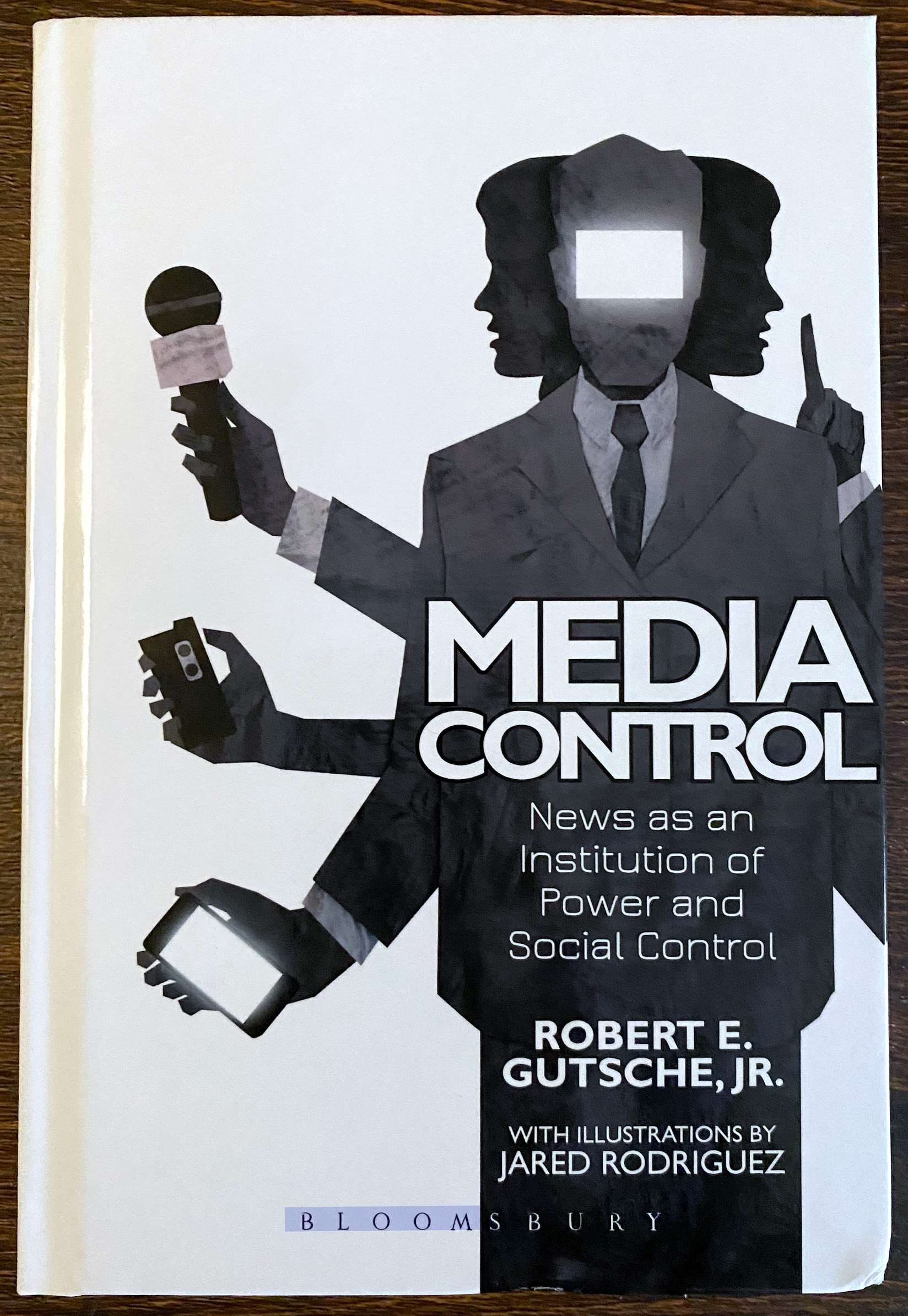 Media Control book cover &mdash; a multi-armed news media figure with a blank television for a face