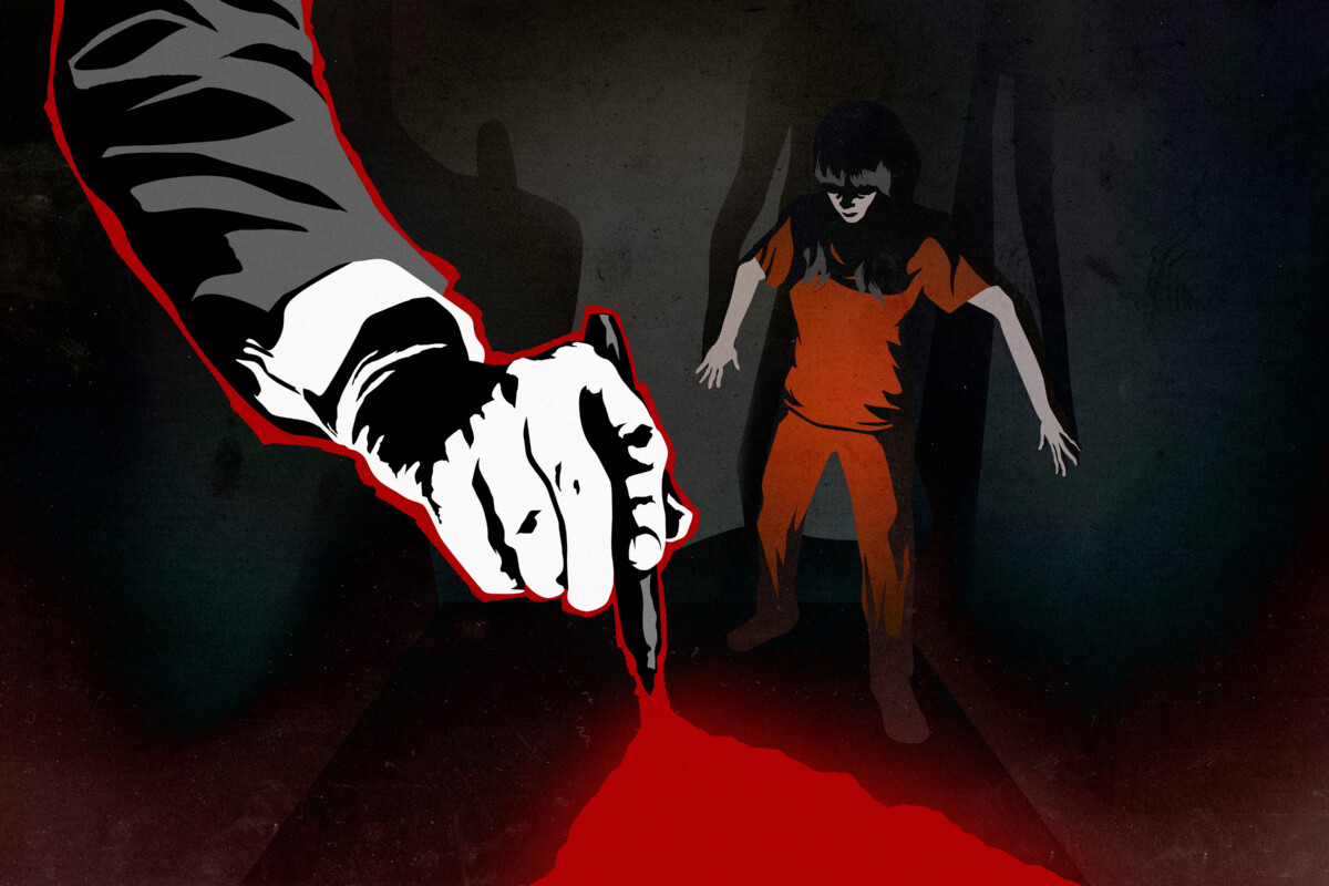 A prisoner is backed into a corner as a hand reaches down with a pen, opening up a red chasm at her feet