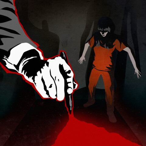 A prisoner is backed into a corner as a hand reaches down with a pen, opening up a red chasm at her feet